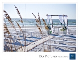 Dreaming of Beach Wedding - White Benches, burlap and Galvanized buckets make up this picture perfect beach Wedding set-up for Dawn and Sean.