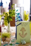 Nautical Themed Table - shabby chic nautical themed table with a Meet the Wedding Party Book. Rachel and Jonathan wanted the guests to know why they choose the members of the wedding party so a book was perfect.